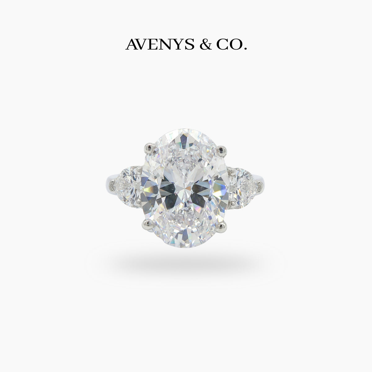 Oval Trilogy Pear Ring with White Oval Stone – on White Gold