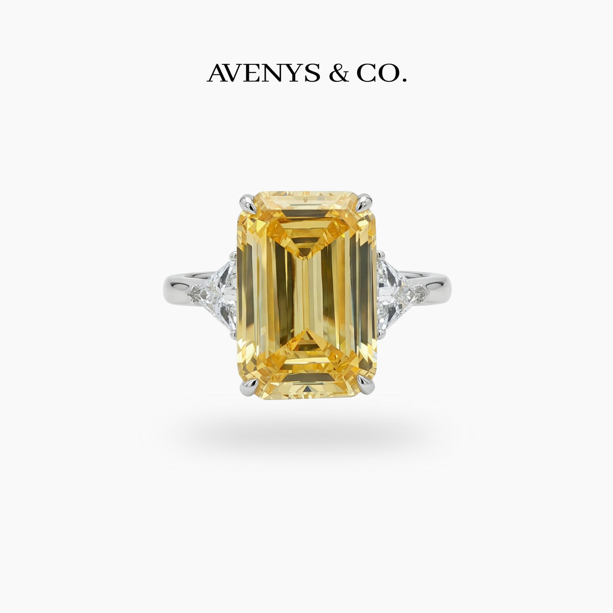 Emerald Trilogy Ring with Yellow Emerald Stone – on White Gold