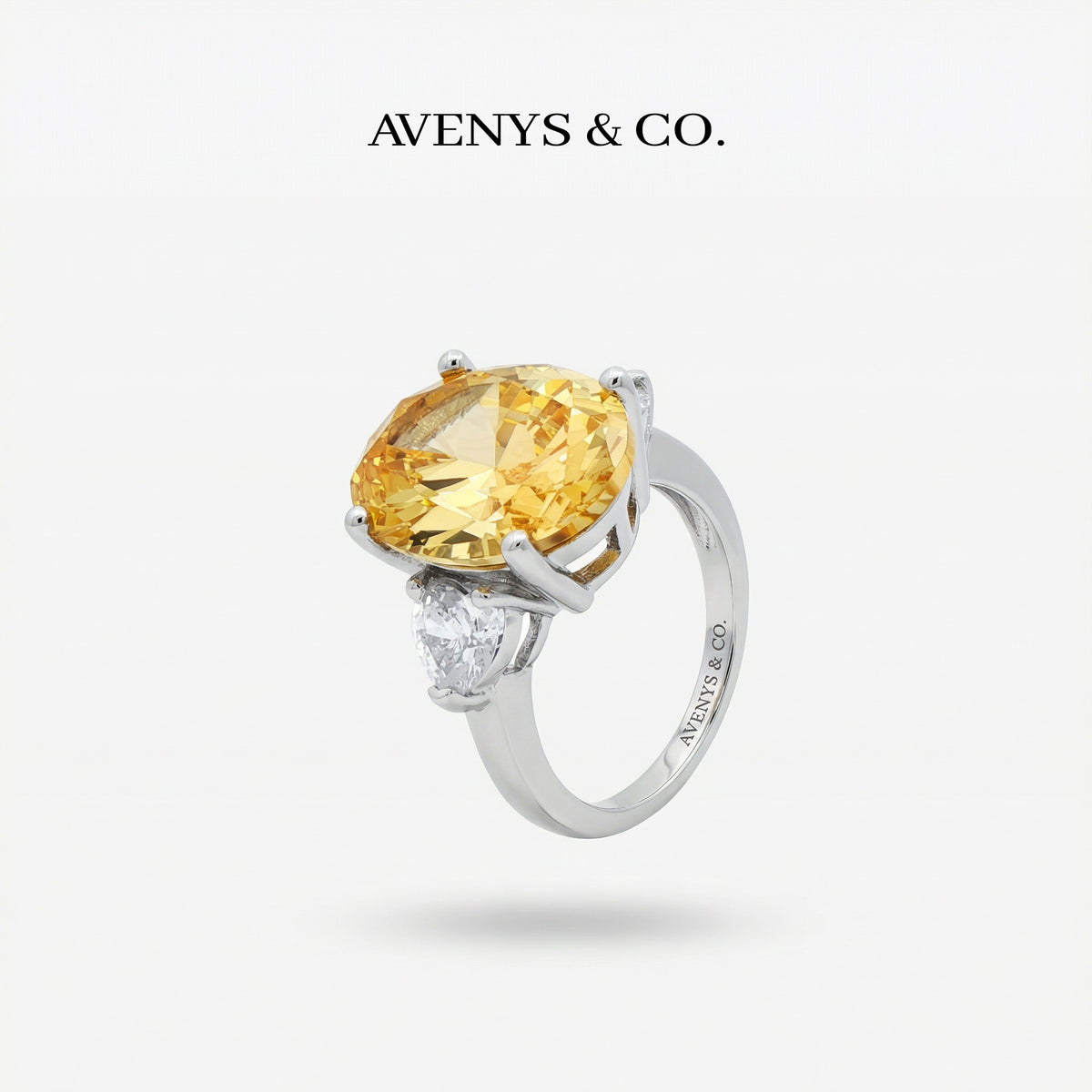 Oval Trilogy Pear Ring with Yellow Oval Stone – on White Gold