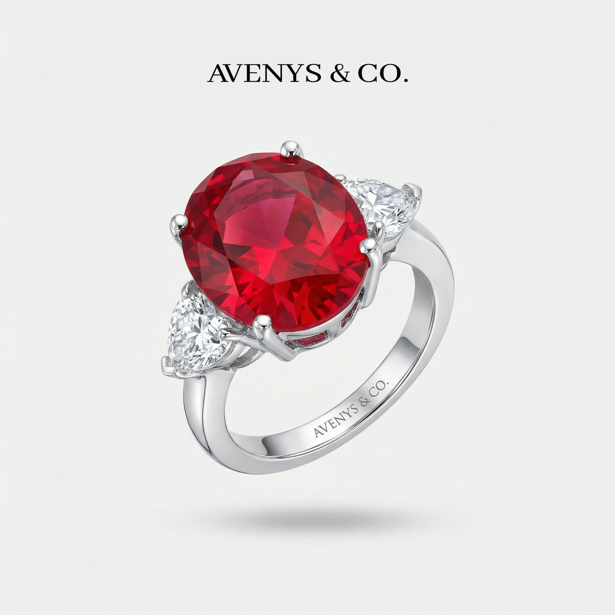 Oval Trilogy Pear Ring with Red Oval Stone – on White Gold