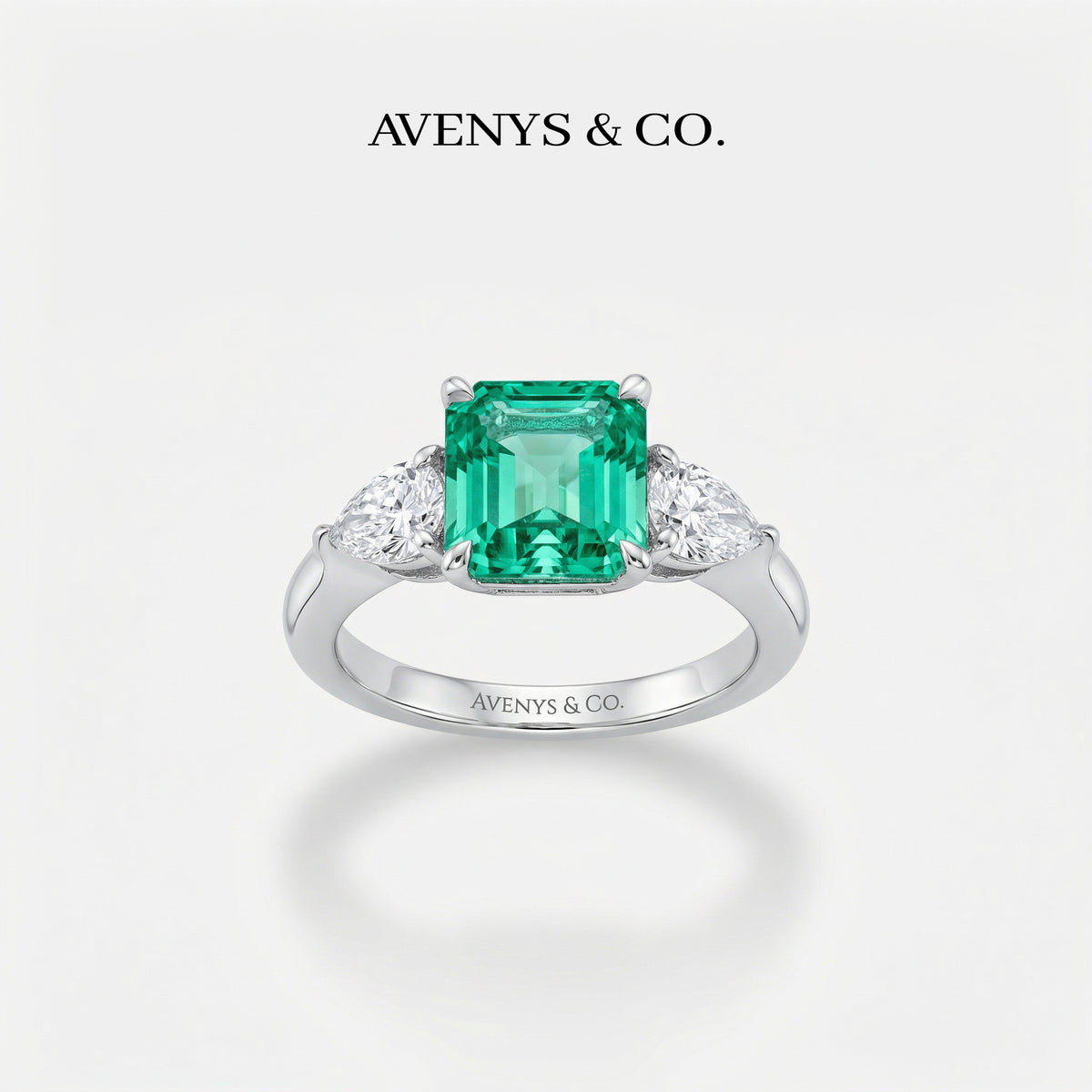 Sea Trilogy Ring with Green Pear Stone – on White Gold