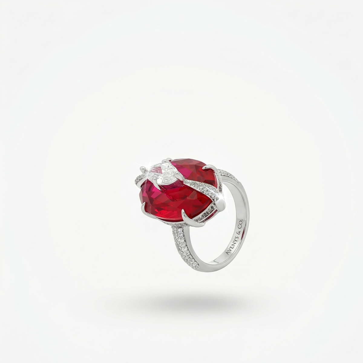 Embrace Queens Ring with Red Oval Stone – on White Gold