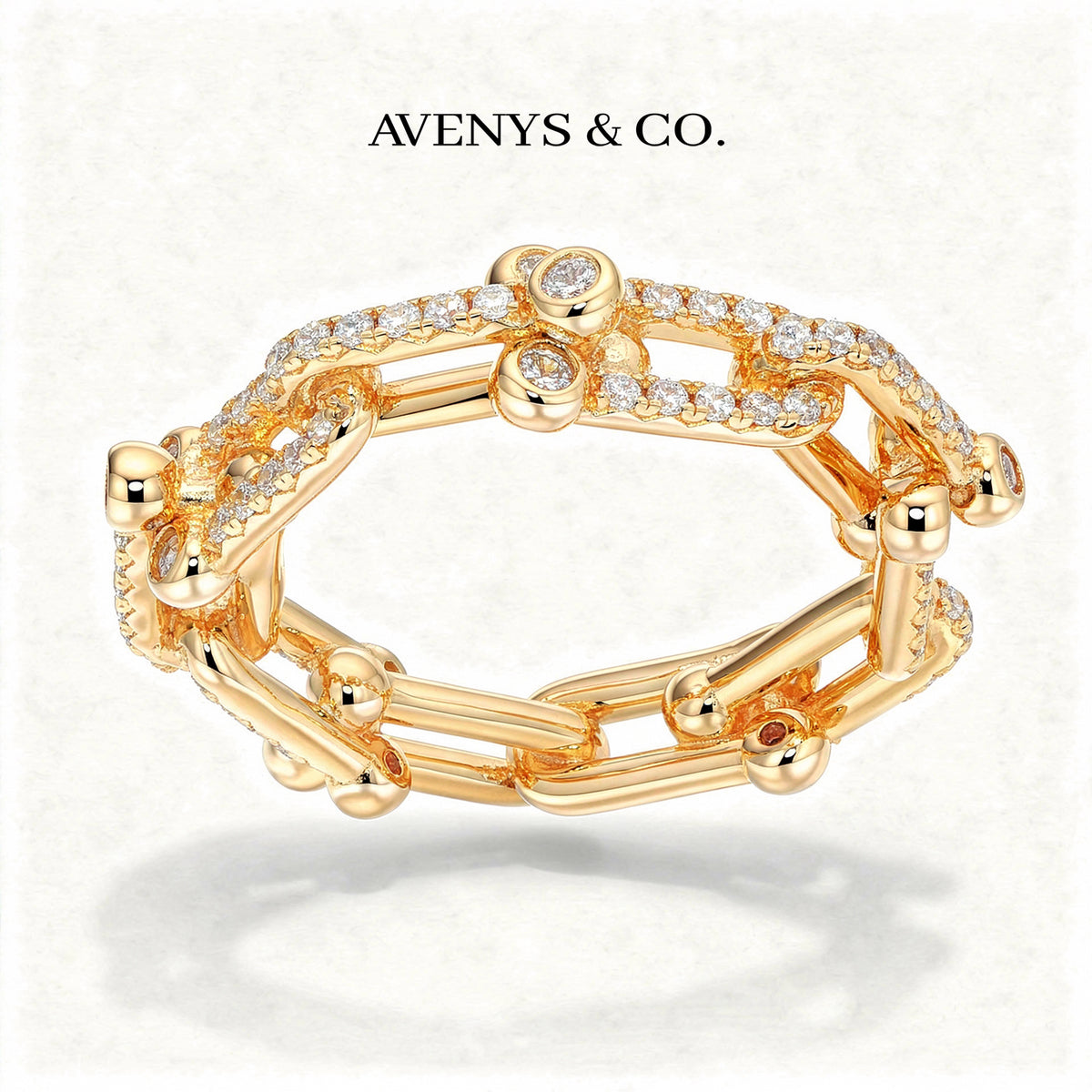 Interlock Pave Ring with White Round Stone – on Yellow Gold
