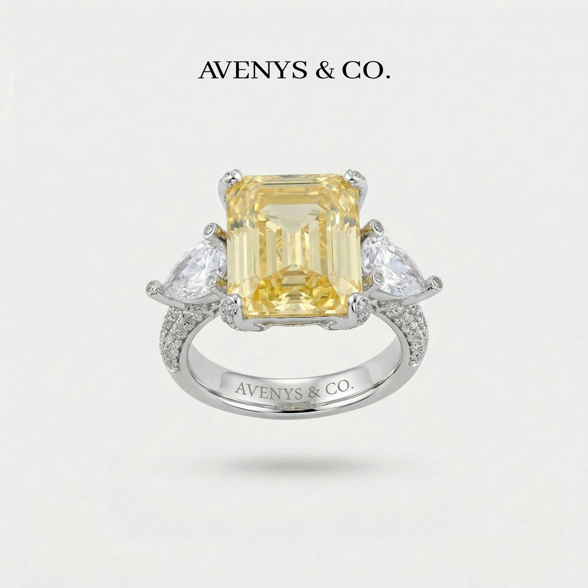 Emerald Pear Trilogy Ring with Yellow Emerald Stone – on White Gold