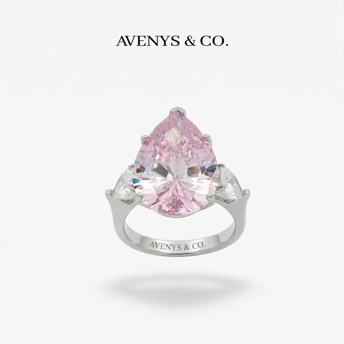 Pear Trilogy Ring with Pink Pear Stone – on White Gold