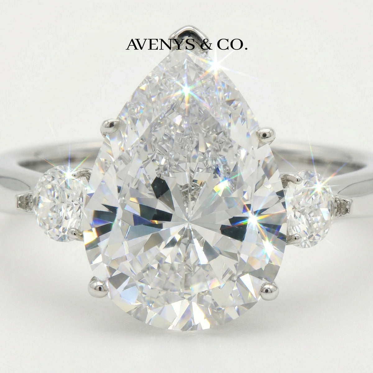 Pear Trilogy Ring with White Pear Stone – on White Gold