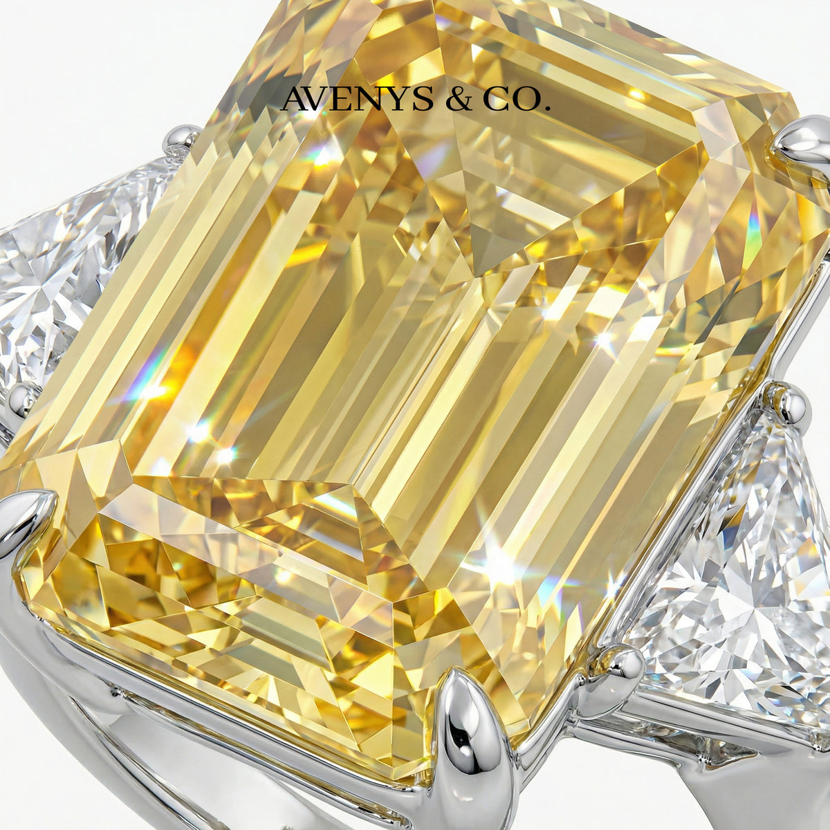 Emerald Trilogy Ring with Yellow Emerald Stone – on White Gold