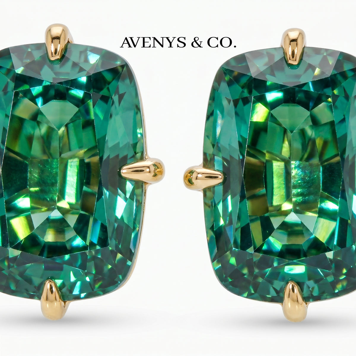 Modern Solitaire Earrings with Blue Oval Stone – on Yellow Gold