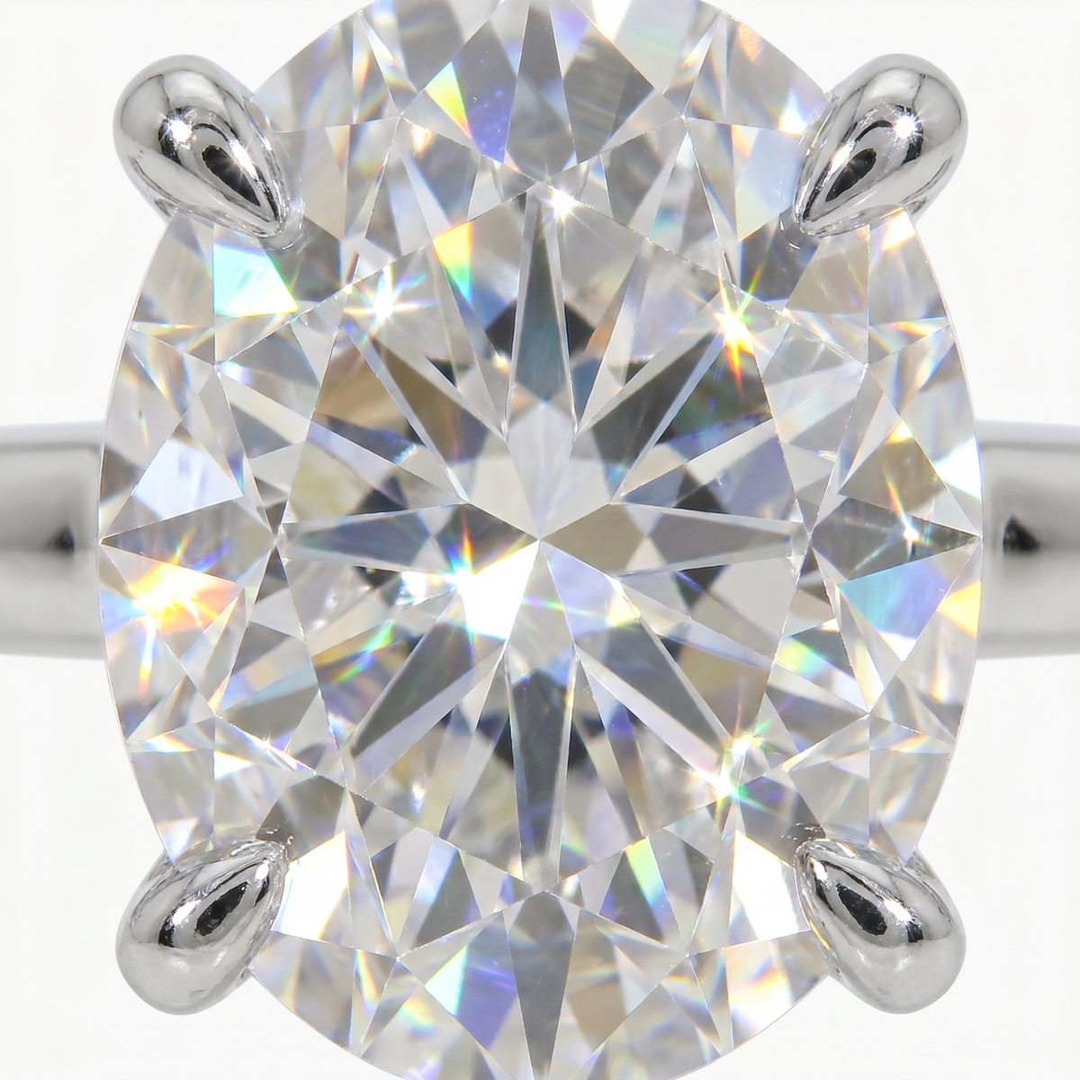 Oval Delicate Ring with White Oval Stone – on White Gold