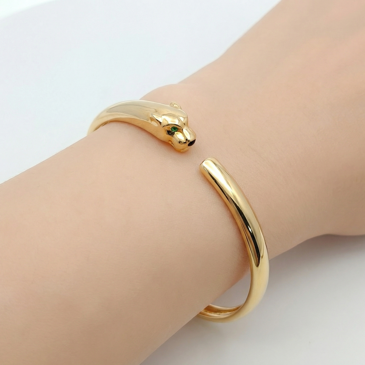 Tiger Bangle with Green Round Stone – on Yellow Gold