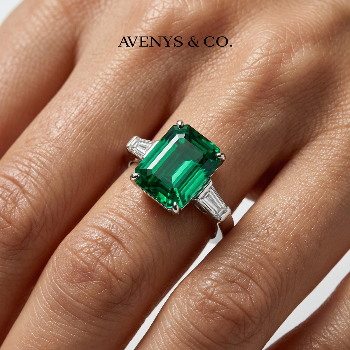 Emerald Trilogy Ring with Green Emerald Stone – on White Gold