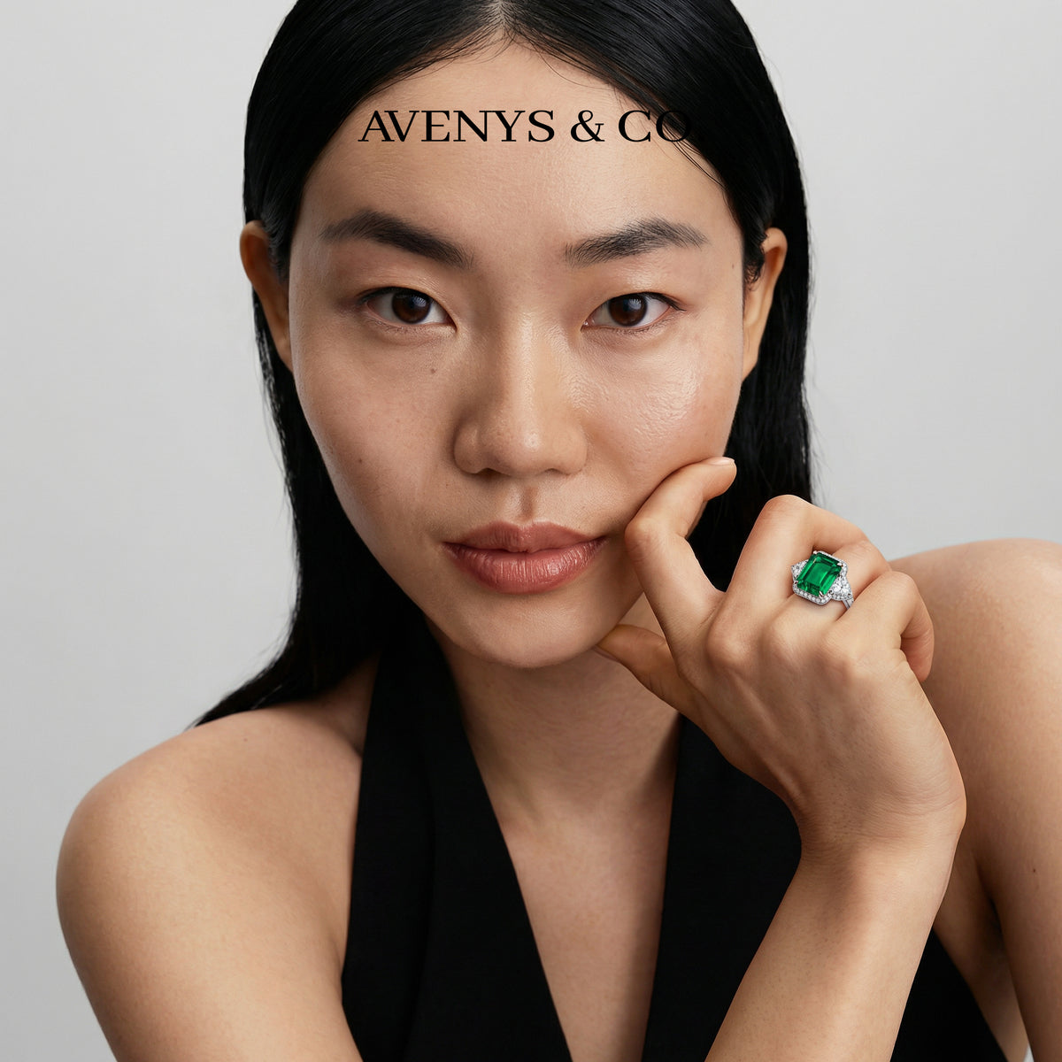 Queens Radiant Ring with Green Radiant Stone – on White Gold