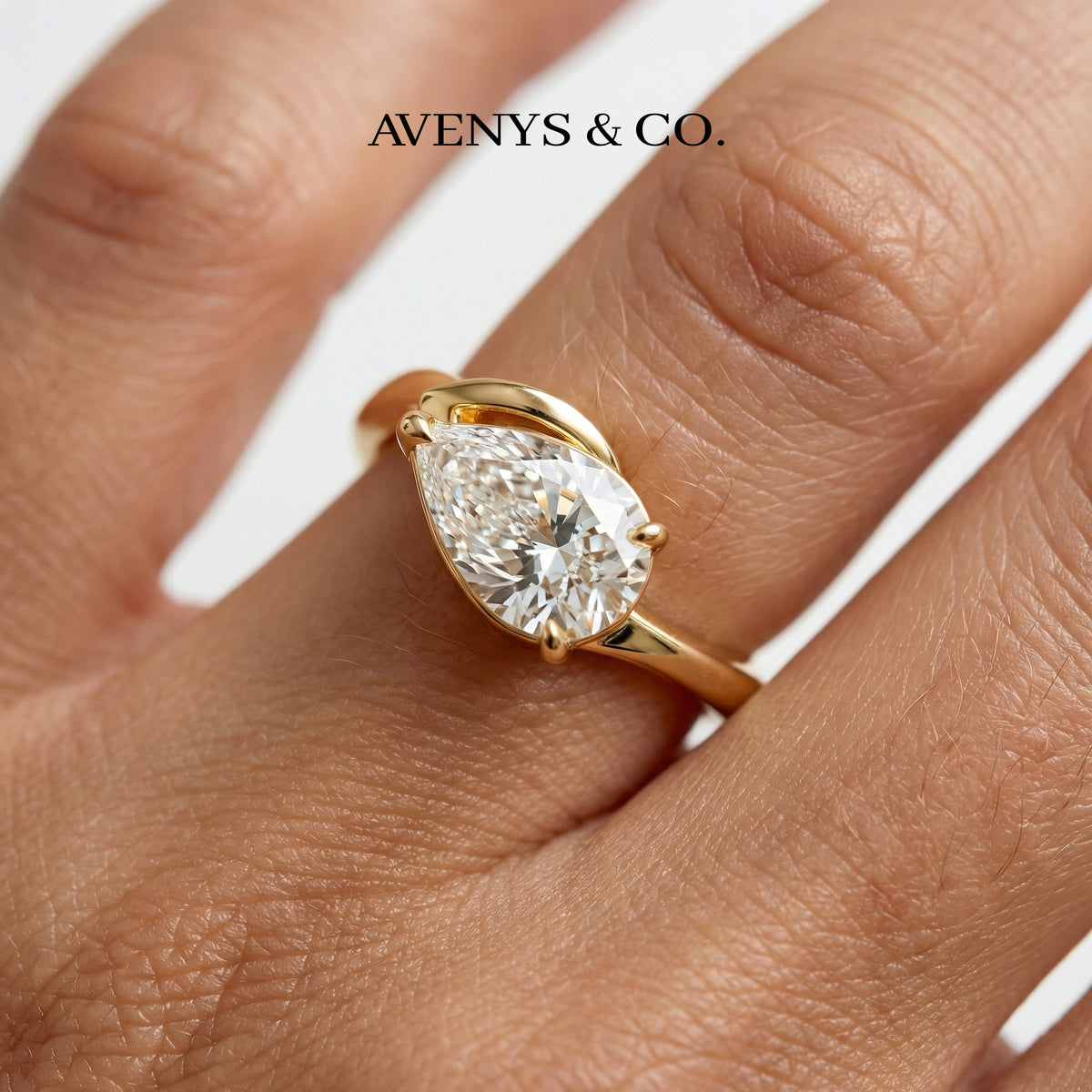 Aerial Pear Ring with White Pear Stone – on Yellow Gold