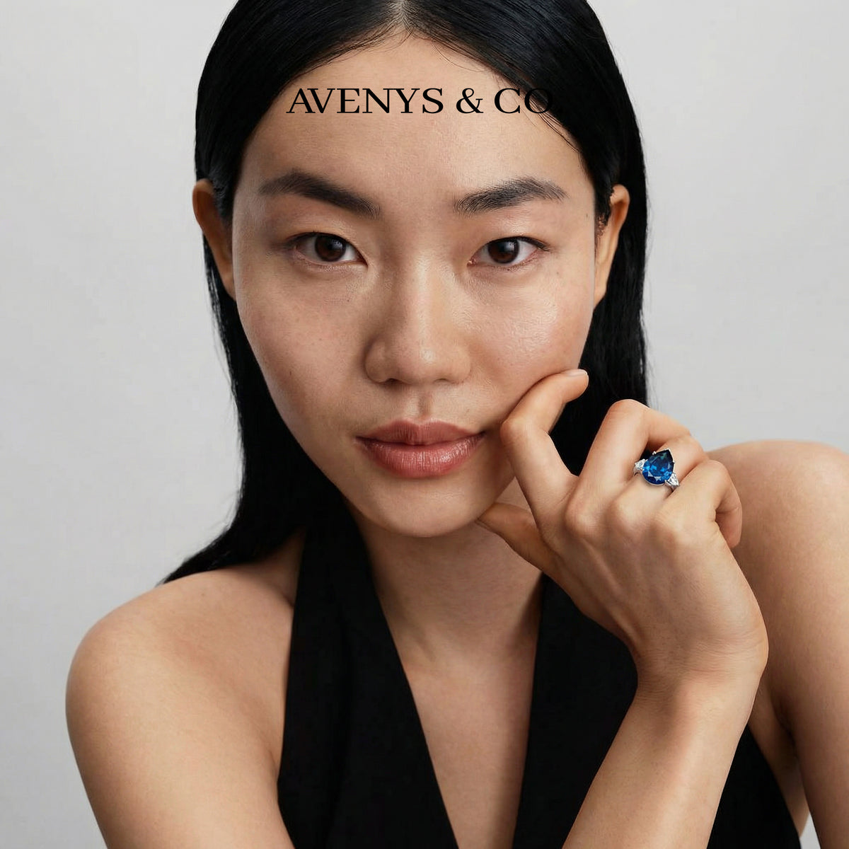 Pear Trilogy Ring with Blue Pear Stone – on White Gold