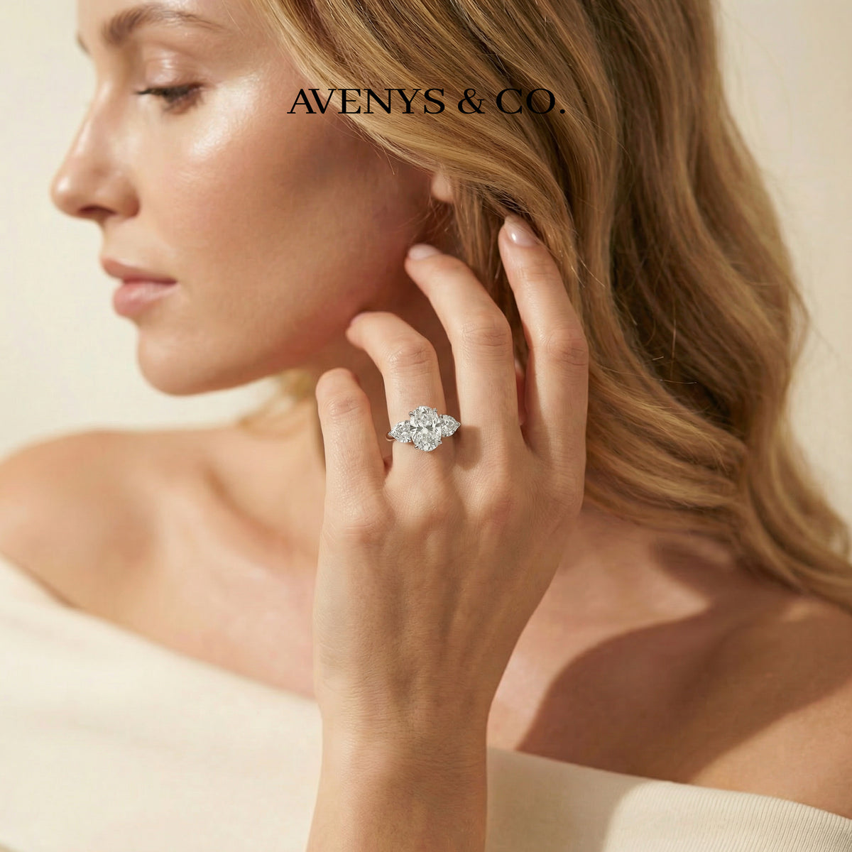 Oval Trilogy Pear Ring with White Oval Stone – on White Gold