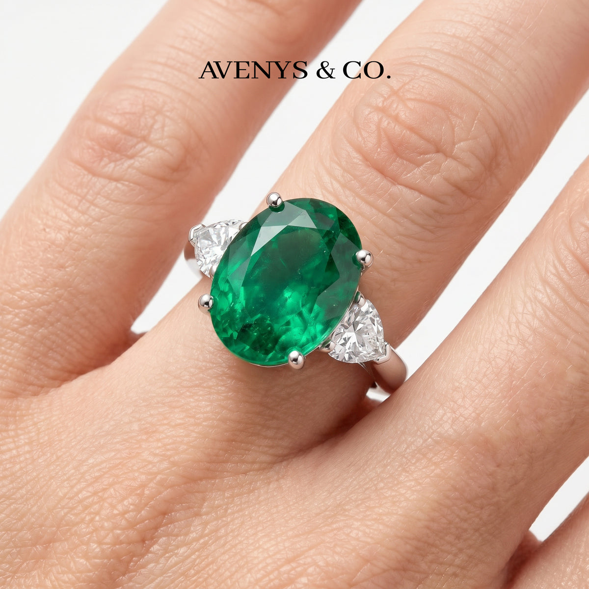 Oval Trilogy Pear Ring with Green Oval Stone – on White Gold