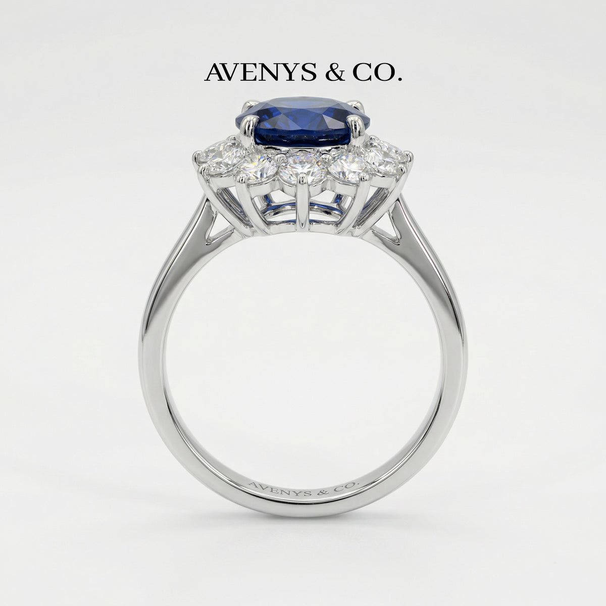 Classic Halo Ring with Blue Oval Stone – on White Gold