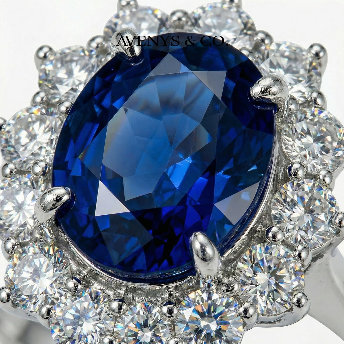 Classic Halo Ring with Blue Oval Stone – on White Gold