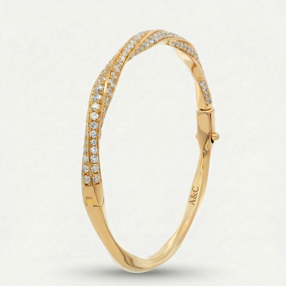 Spiral Bangle with White Round Stone – on Yellow Gold