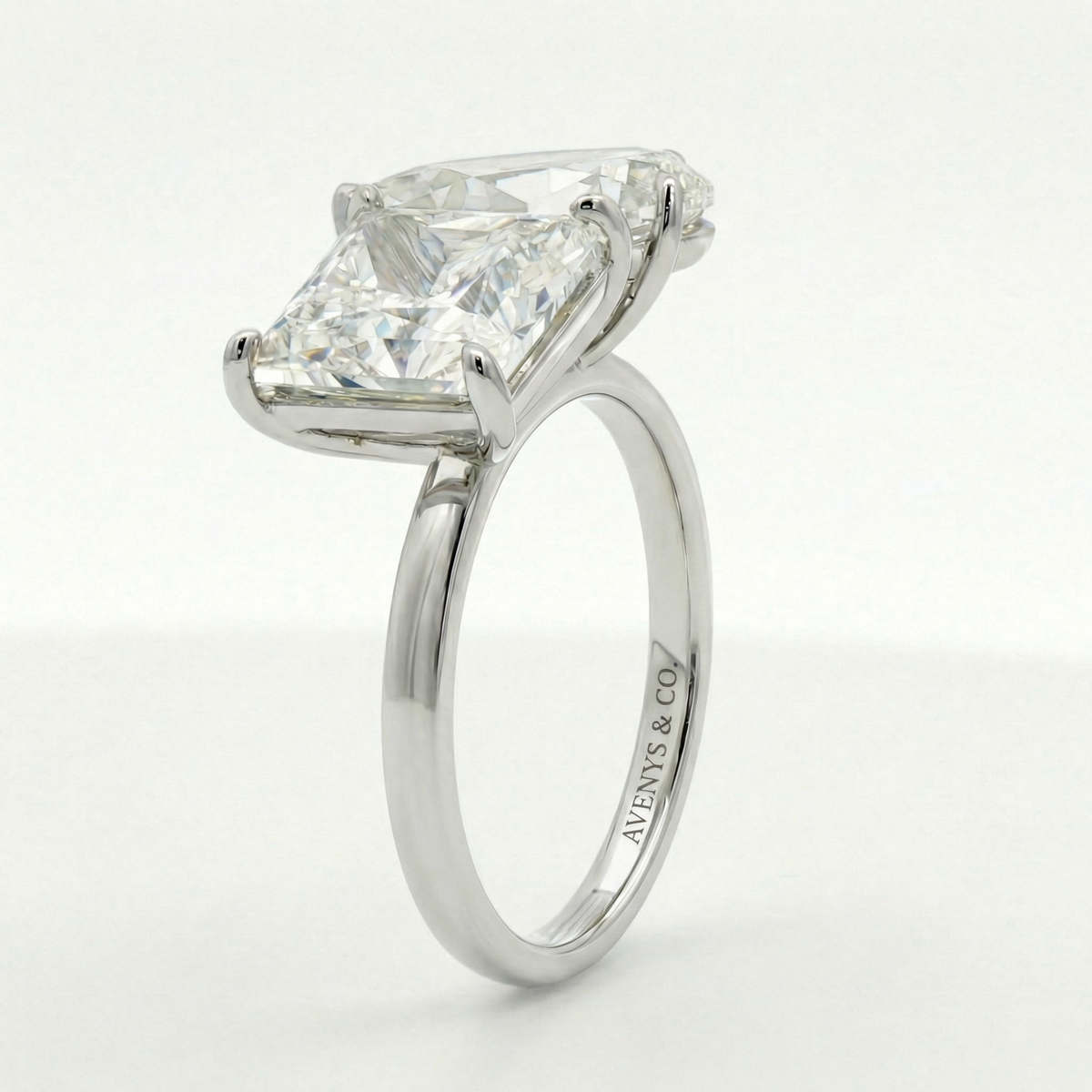Platinum Multistone Ring with Pear Cut Diamond