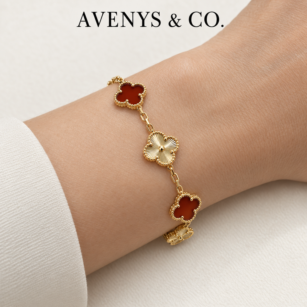 Red and Gold Sunburst bracelet worn on a wrist