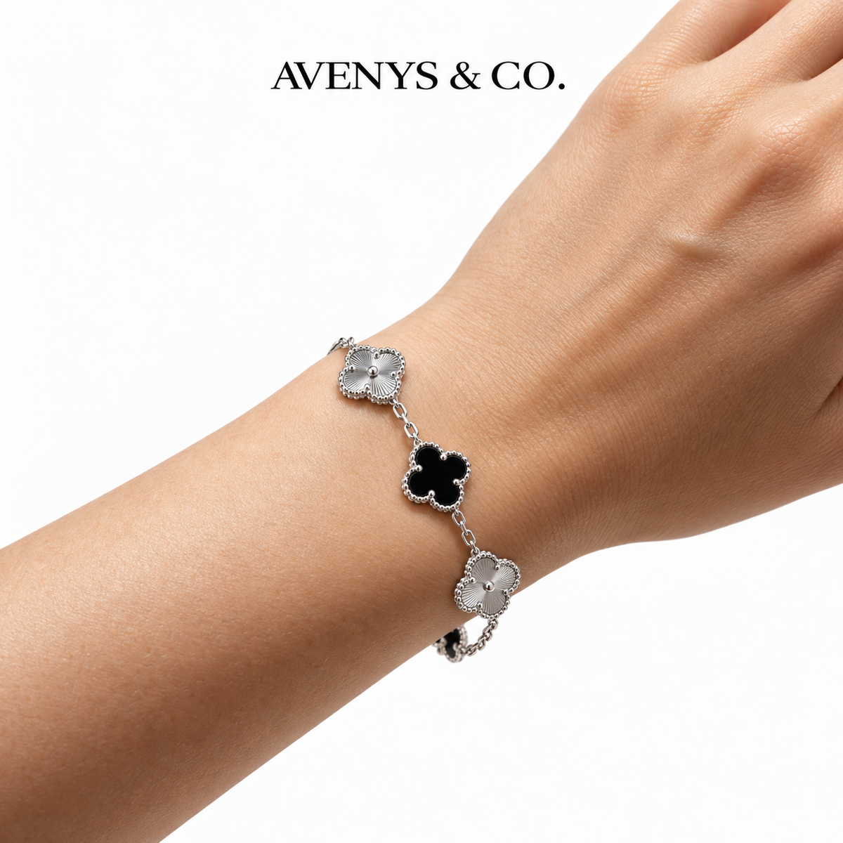 AV Bloom™ Black & Silver Sunburst Bracelet styled on a wrist