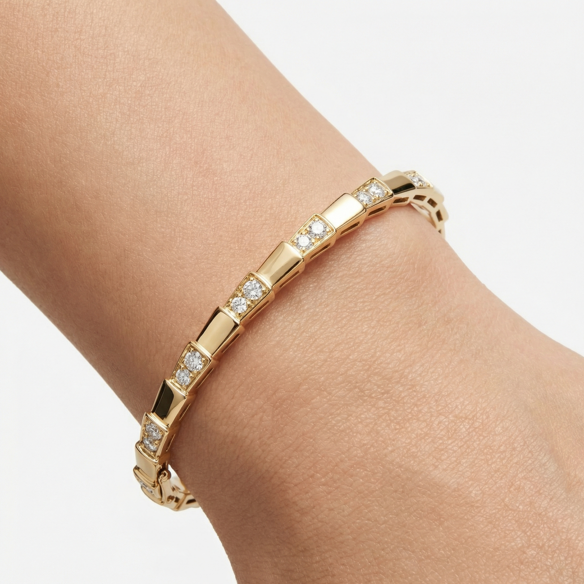 Coil Pave Bangle with White Round Stone – on Rose Gold — Additional wrist view; matches the current catalogue finish and linked rectangle motifs