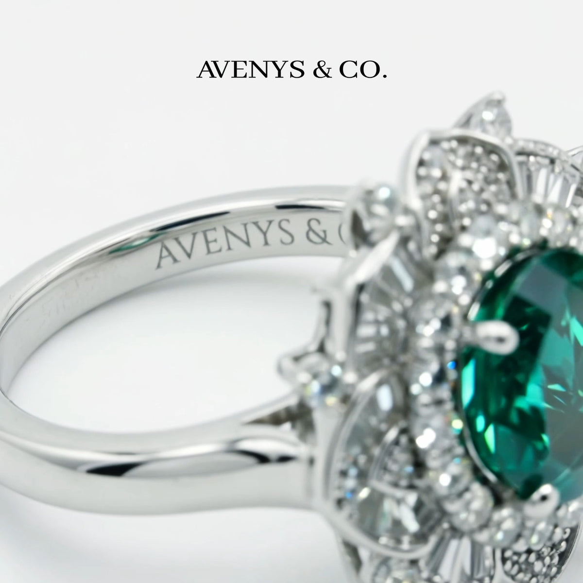 Bloom Burst Ring with Green Oval Stone – on White Gold — Engraving and side-setting macro absent from current front macro