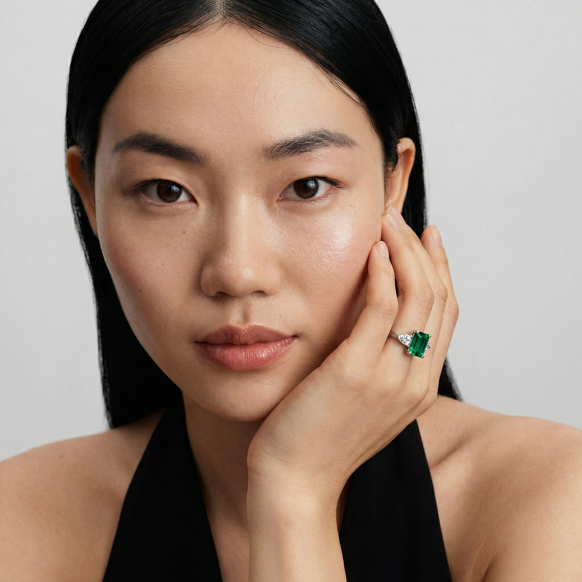 Emerald Pear Trilogy Ring with Green Emerald Stone – on White Gold — Additional model view wearing green Emerald Pear Trilogy