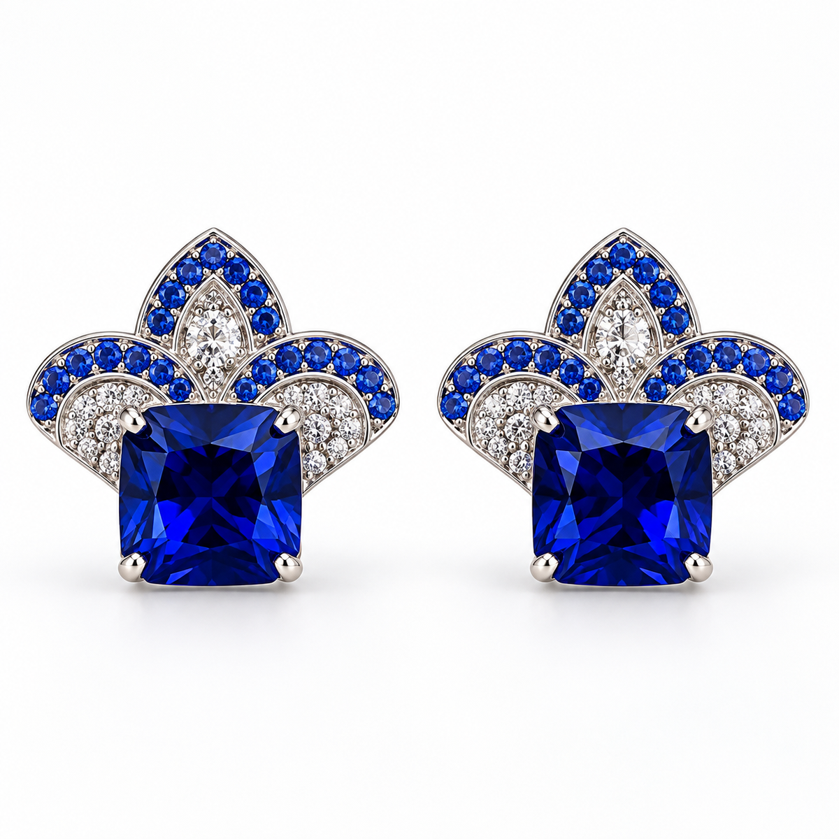 Pair of blue cushion-centre stud earrings with white and blue stones forming a three-lobed crest on a white background.